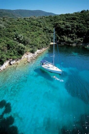 Italy islands private charter in charming blue bay, enjoying the Dolce Vita.