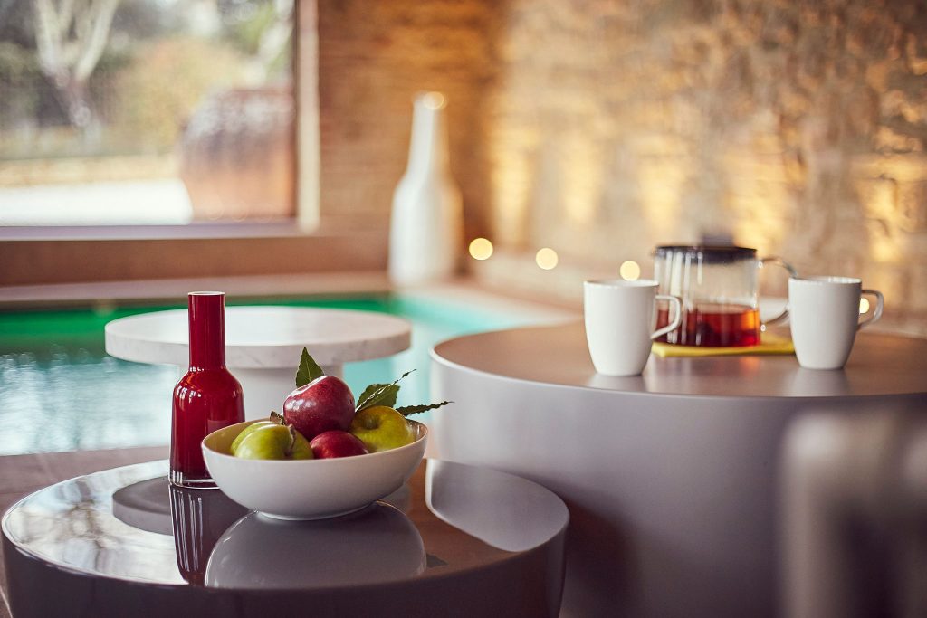 Wellness villa escape in Tuscany with indoor spa, herbal tea and fresh fruit by the heated jacuzzi